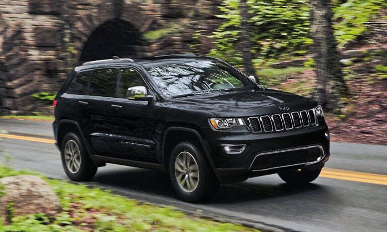 2022 Jeep Grand Cherokee L driving out of a tunnel
