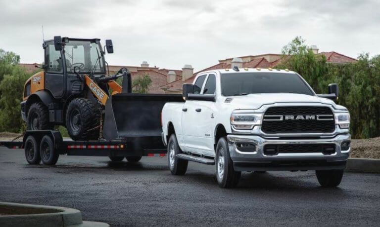 2022 Ram 2500 exterior towing tractor in housing development construction site