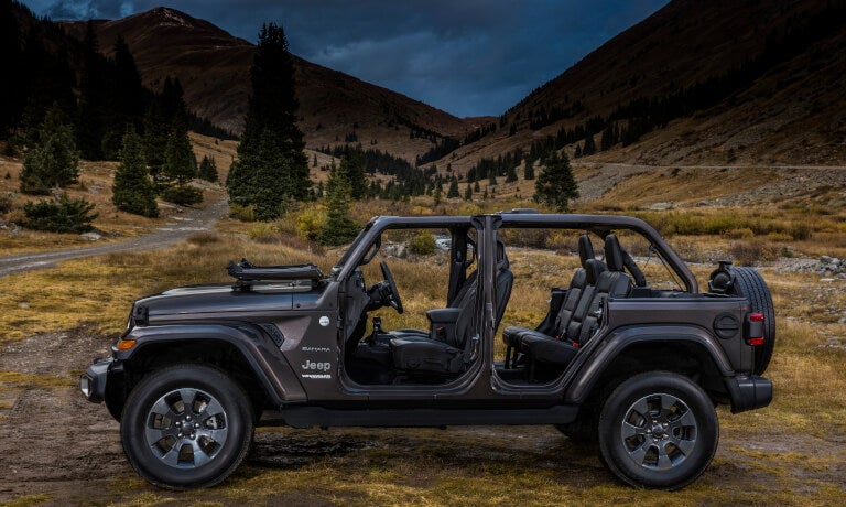 2022 Jeep Wrangler parked in desert with the doors off