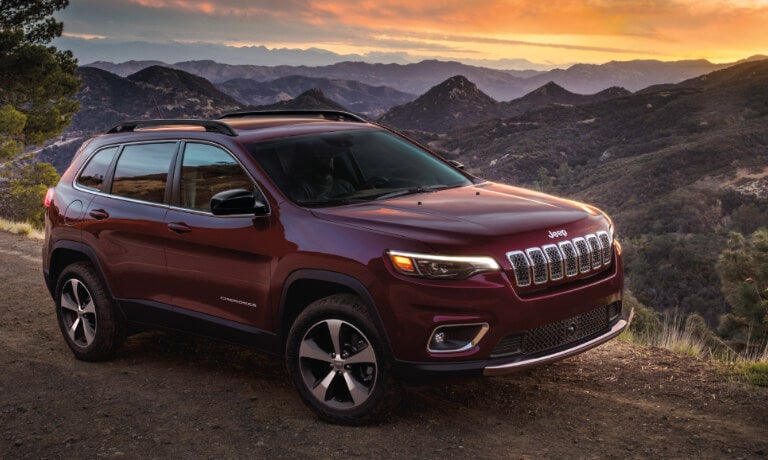 2023 Jeep Cherokee in mountains at sunset