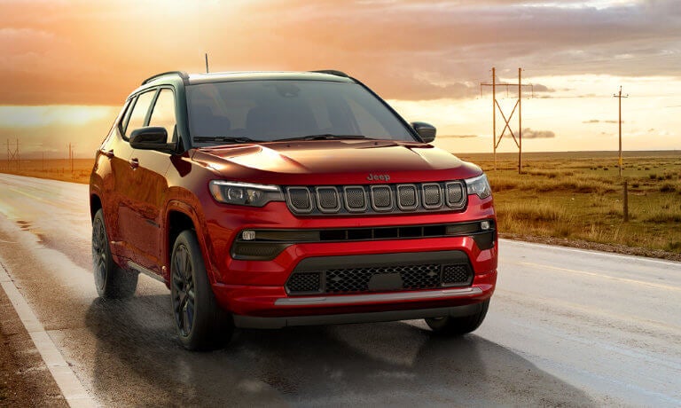 2023 Jeep Compass driving on country road