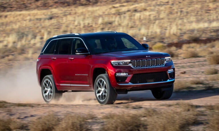 2023 Jeep Grand Cherokee driving on desert trail