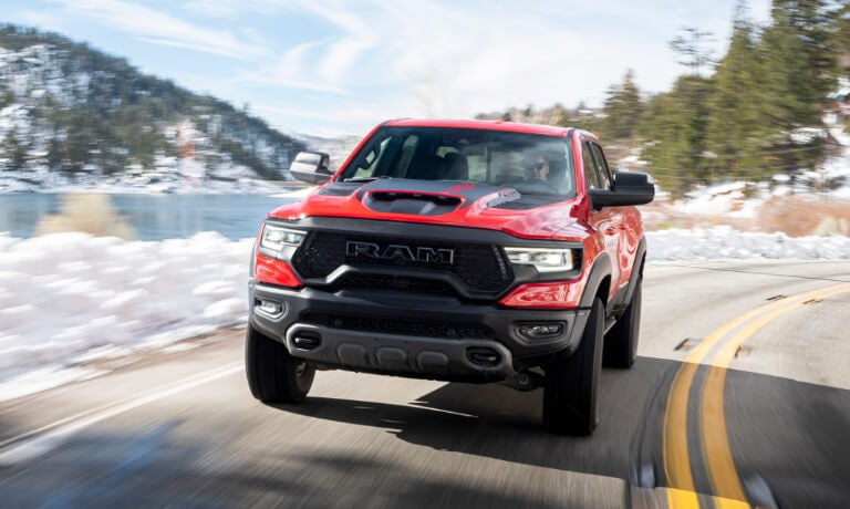2023 Ram 1500 driving fast on winter highway