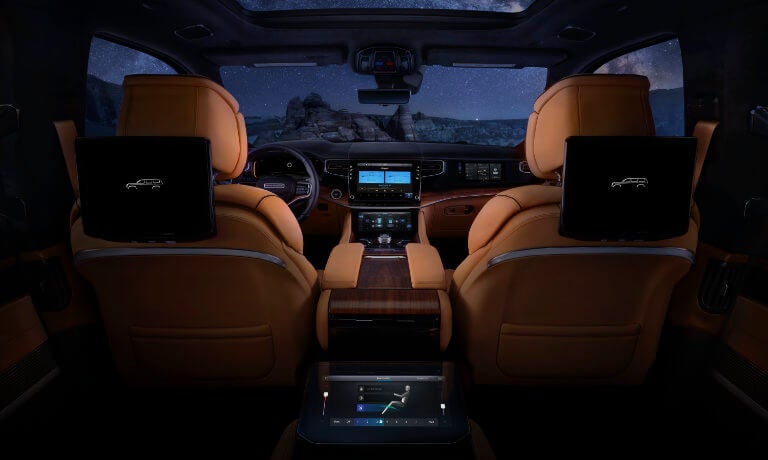 2023 Grand Wagoneer interior front and seats at night