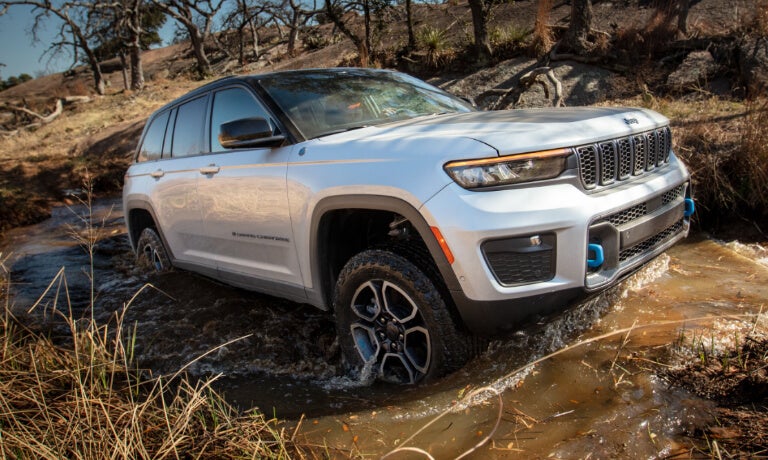 2024 Jeep Grand Cherokee 4xe offroading in stream