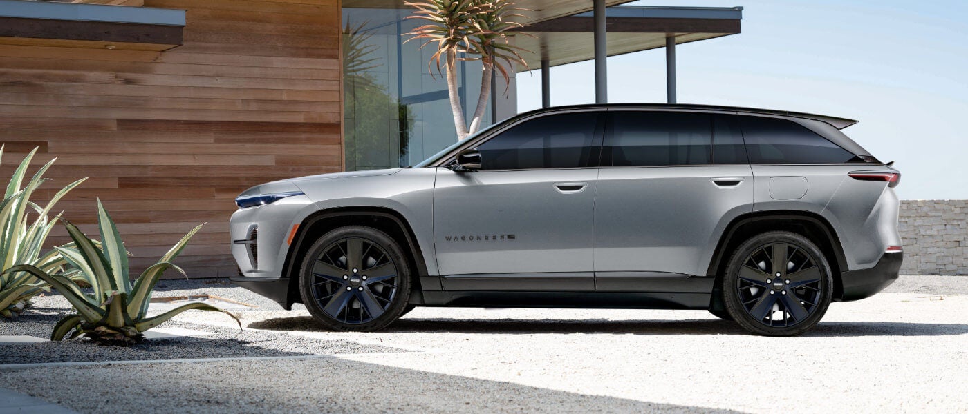 2024 Wagoneer S parked outside a modern home