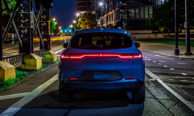 2025 Dodge Hornet tail lights on city street